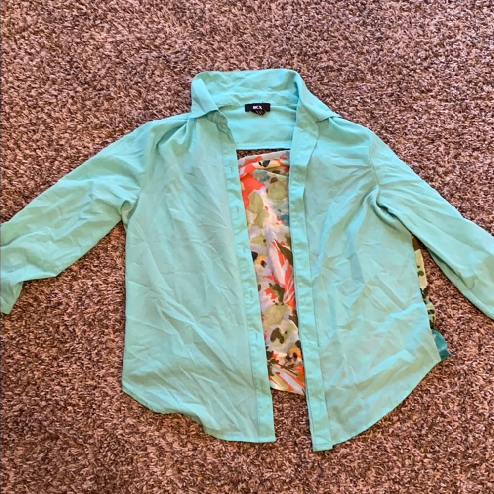 Teal blouse with fun back